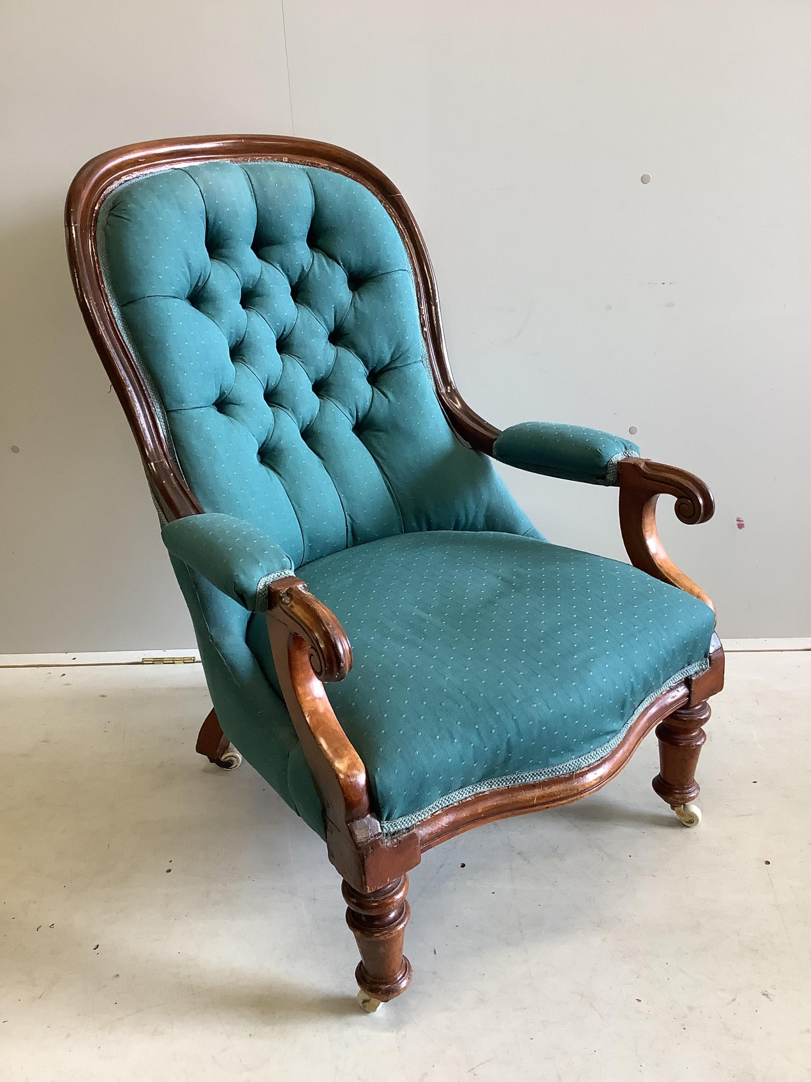A Victorian upholstered mahogany spoon back open armchair, width 68cm, depth 78cm, height 99cm. Condition - fair